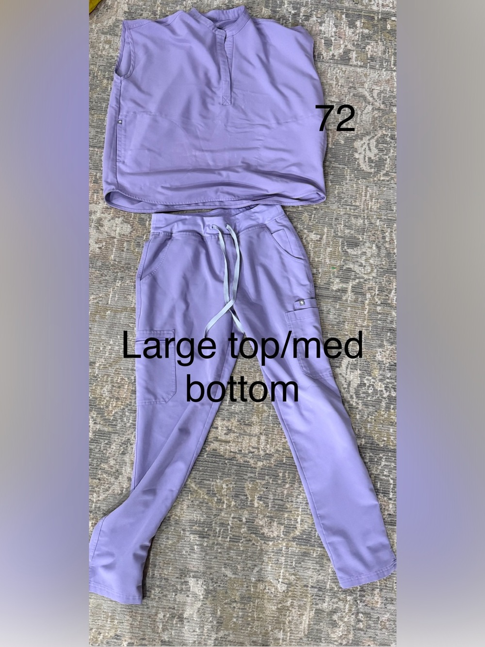 Women’s figs large top med bottom bleach stain on top